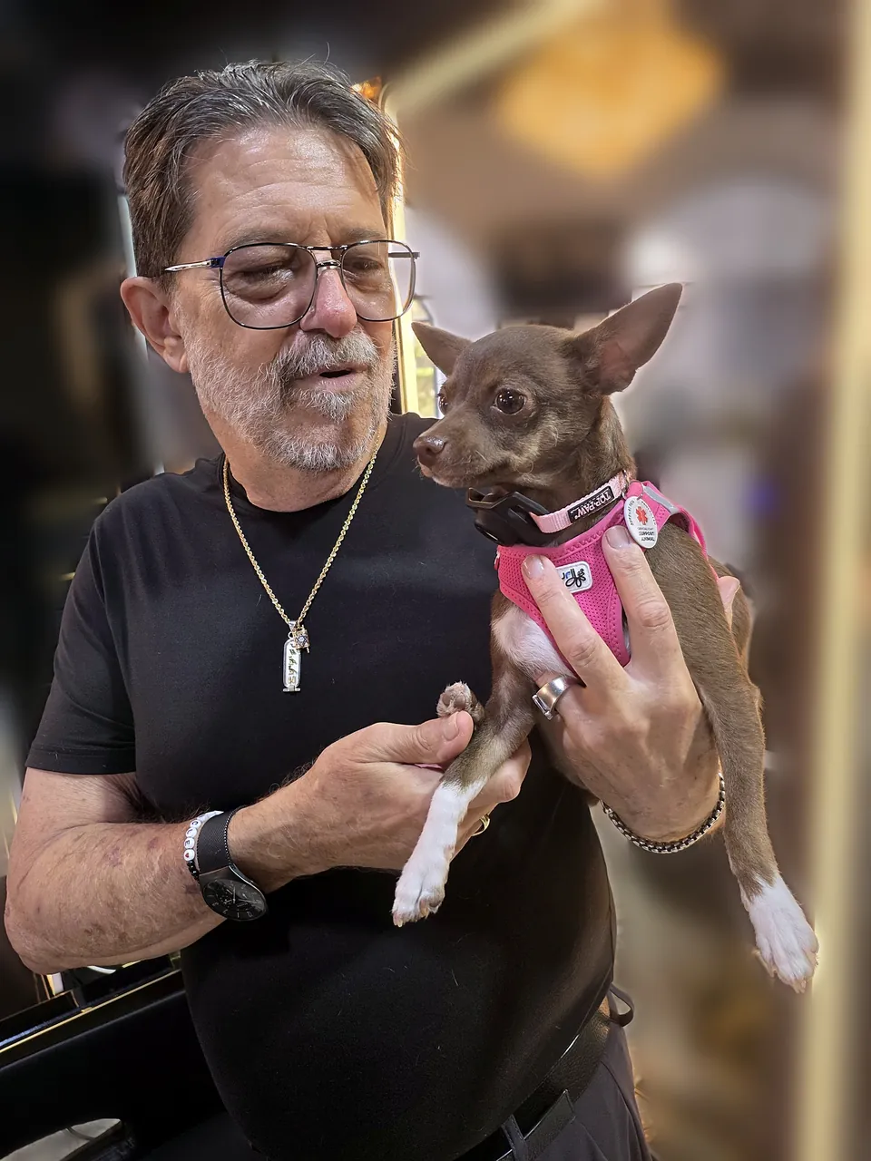 Jimmy holding Demi at a sparkling Palm Beach salon
